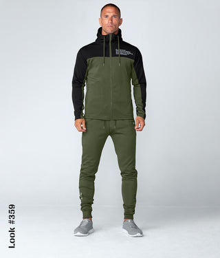 https://cdn.shopify.com/s/files/1/0090/4773/6378/files/BT8000MG-M_born-tough-momentum-track-suit-hoodie-green-black.mp4?v=1631818857